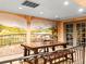 Charming dining area with muraled walls, large table and bench; an inviting space for gatherings at 400 E 3Rd Ave # 305, Denver, CO 80203
