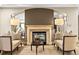 Cozy living room showcasing a decorative fireplace with seating, a warm, inviting space at 400 E 3Rd Ave # 305, Denver, CO 80203