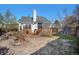 Backyard features a deck, fence, lawn, mature trees, and privacy at 4493 Dunkirk Way, Denver, CO 80249