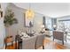 Open dining space with hardwood floors connects seamlessly to the living area at 3080 S Eudora St, Denver, CO 80222
