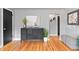 Stylish entryway with hardwood floors, modern decor, and convenient storage options at 3080 S Eudora St, Denver, CO 80222