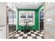 Eat-in kitchen area showcasing sleek stainless steel refrigerator and natural lighting at 3080 S Eudora St, Denver, CO 80222