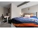 Bedroom with a sports-themed blanket, creating a cozy and inviting atmosphere at 7291 E Bentley Cir, Centennial, CO 80122
