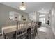 Open concept dining room adjacent to the living room, great for entertaining at 7291 E Bentley Cir, Centennial, CO 80122
