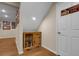 Hallway with decorative display cabinet, sports memorabilia, and good lighting at 7291 E Bentley Cir, Centennial, CO 80122