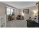 Comfortable living room offering natural light and soft carpet at 7291 E Bentley Cir, Centennial, CO 80122
