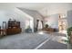 Bright and airy living room with vaulted ceilings and an open-concept design at 7345 S Eagles Nest Cir, Littleton, CO 80127