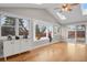 Bright room features hardwood floors, large windows, and skylights, offering ample natural light at 3175 Zinnia Ct, Golden, CO 80401