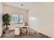 Bedroom with a bright window and space for a small desk or vanity at 14700 E 104Th Ave # 2802, Commerce City, CO 80022