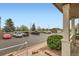 Convenient parking lot view with multiple vehicles and verdant landscaping at 14700 E 104Th Ave # 2802, Commerce City, CO 80022