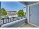 Cozy balcony provides an outdoor retreat with views of the community and surrounding landscape at 5255 Memphis St # 317, Denver, CO 80239