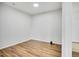 This bedroom features light floors, a white walls, and minimal decor at 5255 Memphis St # 317, Denver, CO 80239