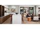 Stylish lounge features a large island, bar stools, and comfortable seating at 851 Coal Bank Trl, Castle Rock, CO 80104
