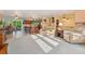 Bright and spacious living room with comfortable seating and views of the kitchen at 5870 Quail St, Arvada, CO 80004