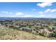 Expansive aerial view of condos highlighting the community's serene location and stunning mountain views at 13850 E Marina Dr # 304, Aurora, CO 80014