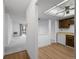 Modern apartment featuring new vinyl plank floors and combined dining and living area at 13850 E Marina Dr # 304, Aurora, CO 80014