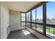 Bright sunroom featuring large windows with views of the outdoors and letting in ample sunlight at 13850 E Marina Dr # 304, Aurora, CO 80014
