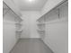 Spacious walk-in closet with ample shelving and bars for organized storage solutions at 13850 E Marina Dr # 304, Aurora, CO 80014