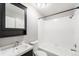 Clean bathroom features a tub/shower combination, modern sink, and a sleek mirror, providing functionality and style at 14343 E Dickinson Dr # E, Aurora, CO 80014