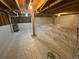 Bright basement with wooden support beams and encapsulated walls, perfect for extra storage or living space at 324 County Road 672, Breckenridge, CO 80424