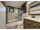 Bathroom featuring tile flooring, tile shower with glass door, and vanity at 324 County Road 672, Breckenridge, CO 80424