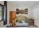 Comfortable Bedroom featuring a crib, dresser, and natural light at 324 County Road 672, Breckenridge, CO 80424