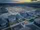 An aerial view of a neighborhood featuring homes, parks and a green space at 6905 Fraser Cir, Frederick, CO 80530