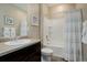 Functional bathroom featuring vanity sink, and a shower tub with a shower curtain at 6905 Fraser Cir, Frederick, CO 80530