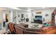 Spacious finished basement featuring a large sectional sofa and entertainment area at 6520 Empire Ave, Frederick, CO 80516