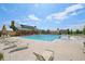 Large swimming pool, splashpad, and comfortable lounge chairs create an inviting place to relax at 6520 Empire Ave, Frederick, CO 80516