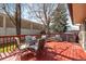 A spacious back deck featuring charming outdoor seating, perfect for relaxation and entertaining at 8210 W 72Nd Pl, Arvada, CO 80005