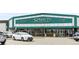 Storefront of a Sprouts Farmers Market, featuring a white sign, large glass windows and parking at 8210 W 72Nd Pl, Arvada, CO 80005