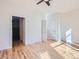 Bright bedroom with hardwood floors and access to bathroom at 2345 Walnut St # 24, Denver, CO 80205