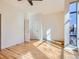 Bright bedroom with hardwood floors and large window at 2345 Walnut St # 24, Denver, CO 80205