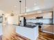 Modern kitchen with stainless steel appliances and granite island at 2345 Walnut St # 24, Denver, CO 80205