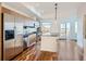Modern kitchen with stainless steel appliances and hardwood floors at 2345 Walnut St # 24, Denver, CO 80205