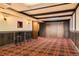 Finished basement with dark trim, open ceiling and decorative lighting at 10247 W Arkansas Ave, Lakewood, CO 80232