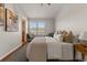Relaxing bedroom with hardwood floors, bright windows and ensuite bathroom at 15612 E 96Th Way # 9B, Commerce City, CO 80022