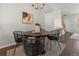 Modern dining area with stylish decor and a sleek chandelier, perfect for intimate meals at 15612 E 96Th Way # 9B, Commerce City, CO 80022