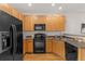 Well-equipped kitchen with appliances and cabinetry providing ample storage and functionality at 15612 E 96Th Way # 9B, Commerce City, CO 80022