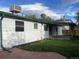 Exterior view of the backyard featuring a patio and partial view of the home's rear facade at 2617 S Cimarron St, Aurora, CO 80014