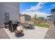 Outdoor patio with fire pit and dining set, perfect for entertaining at 7415 E 158Th Pl, Thornton, CO 80602