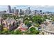 Stunning aerial view of the Denver skyline with mature trees at 2227 N Ogden St, Denver, CO 80205