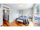 Bedroom with hardwood floors, natural light and stylish furnishings and decor at 2227 N Ogden St, Denver, CO 80205