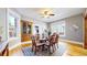 Well-lit dining room featuring hardwood floors, classic furnishings, and decorative elements for an inviting space at 2227 N Ogden St, Denver, CO 80205