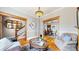 Spacious living room with hardwood floors, a staircase, elegant furniture, and decorative accents at 2227 N Ogden St, Denver, CO 80205