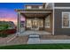 Back patio with a ceiling fan and backyard view, perfect for relaxing and entertaining at 10003 Atlanta St, Parker, CO 80134