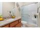 Bathroom featuring granite countertop vanity and updated walk-in shower at 10003 Atlanta St, Parker, CO 80134