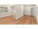 A large bedroom featuring wood-look floors, a window and an oversized closet at 10003 Atlanta St, Parker, CO 80134