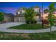 Charming two-story home with a three car garage and landscaped yard at 10003 Atlanta St, Parker, CO 80134